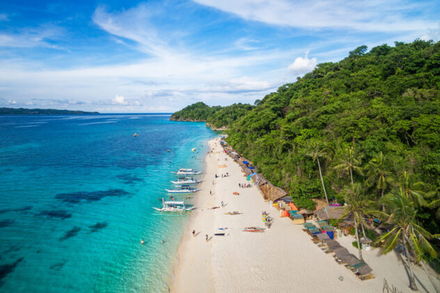 Boracay Island, Philippines, aerial view of Puka Shell Beach on a sunny day.