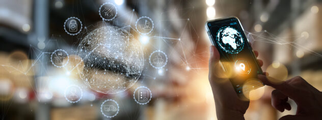 Businesss Workers using smartphone cargo and tracking delivery for Transportation and global network of smart logistics in blur warehouse background.