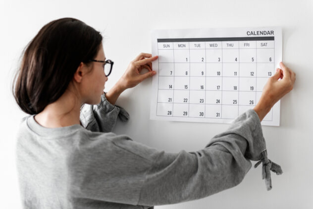 Woman checking the calendar