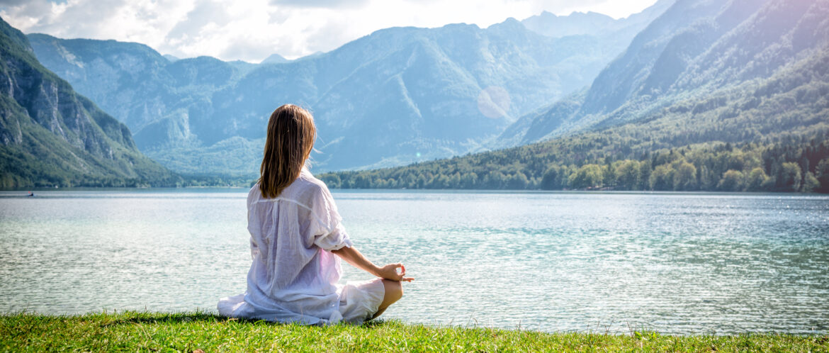 serenity and yoga practicing at the lake Bohinj. Slovenia